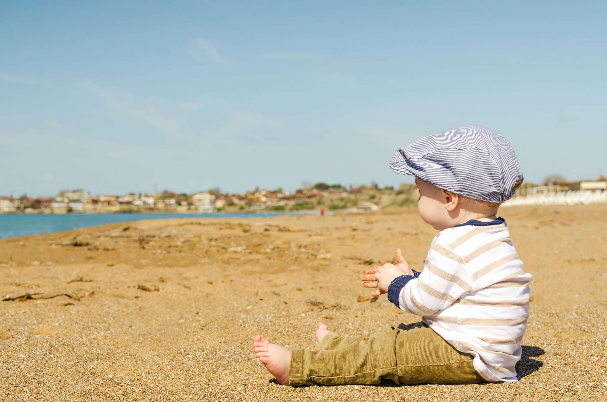 baby on holiday at beach